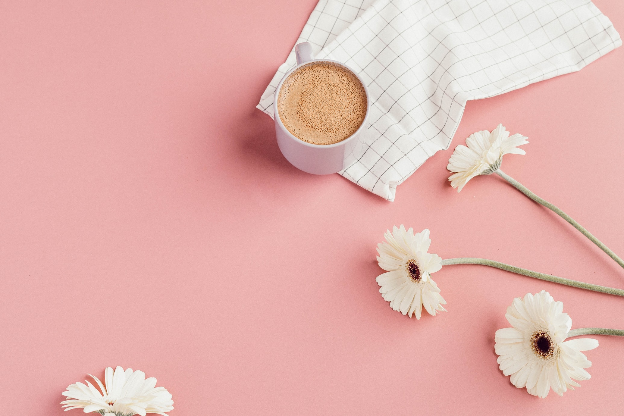 coffee and flowers on a table